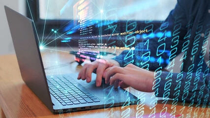 Hands typing on computer with algorithm image overlay.