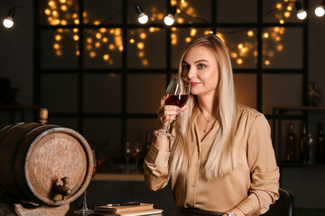 Female sommelier tasting types of wine