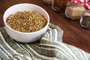 Bowl with chimichurri on striped cloth