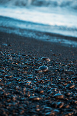 black stones on the beach