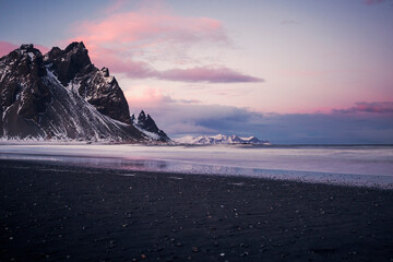 sunset in front of vestrahorn mountain in iceland