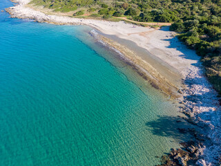 Aerial drone view of beautiful Gialiskari Beach next to Agios Spiridon in corfu island, Greece