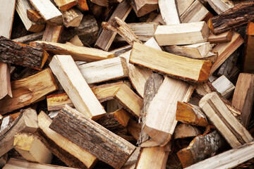 Background in the form of firewood chopped for heating the house.
