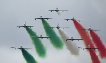 Italian air show showing the flag colors during the independence day