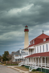 Vertical shot of a Cape May lighthouse in stormy weather.