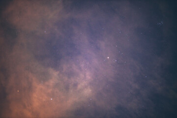 clouds in the sky with stars