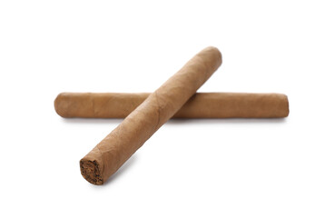 Cigars wrapped in tobacco leaves on white background