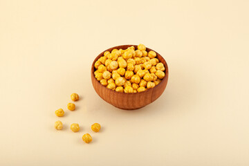 Leblebi or Roasted Chickpeas in wooden bowl. Turkish snack