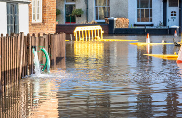 Bewdley floodwater being pumped from riverside residential homes,near Bewdley...
