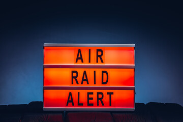 Air raid alert words on lightbox