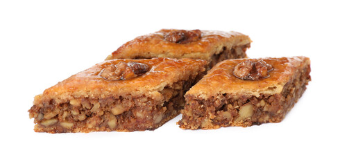 Delicious honey baklava with walnuts on white background