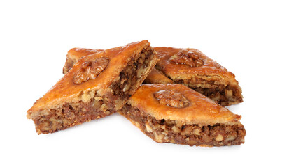 Delicious honey baklava with walnuts on white background