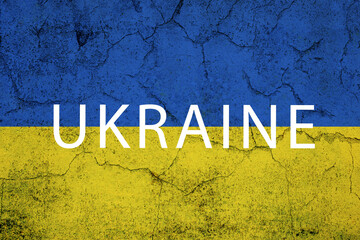 Ukrainain flag on a textured wall, national idendity, war crisis between Ukraine and Russia, political issue 