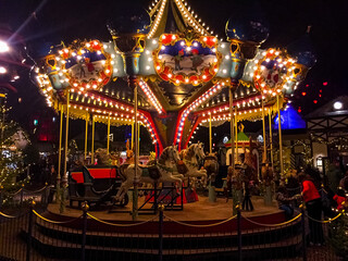 Lit carousel on Tivoli in Denmark at christmas time