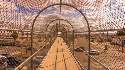 Beautiful shot of a crosswalk bridge with a metal cover