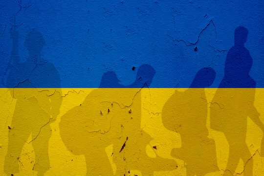 Ukraine flag on wall and shadows of soldier and refugees leaving. Ukraine war concept