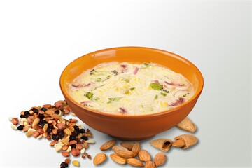 Tasty traditional dish food in the bowl on the desk