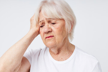 elderly woman health lifestyle migraine isolated background