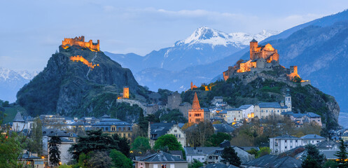Historical Sion town with its two castles at late evening Switzerland - 490187711
