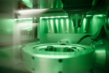 Cad cam milling machine in dental laboratory. Production of high esthetic dental crowns and dentures.