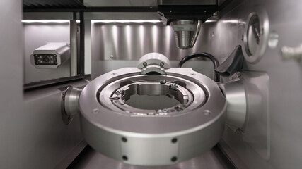 Cad cam milling machine in dental laboratory. Production of high esthetic dental crowns and...