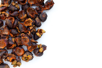 Dried mangosteen peel on white background.