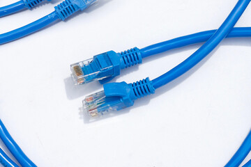LAN network connection ethernet blue cables on white background.