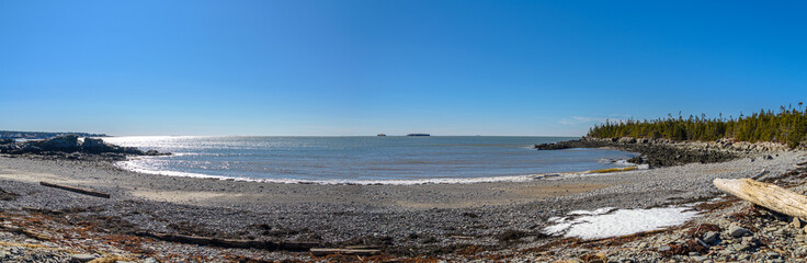 Fototapeta na wymiar Panoramic Image of Beach on Sunny Winter Day