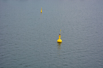 Safe water mark buoy in the middle of the sea