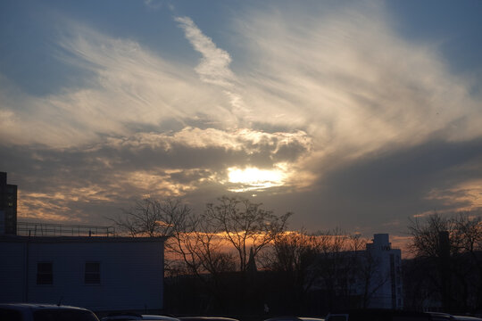 Beautiful scene of the sunrise sky on building and trees in West Point, NY State, USA