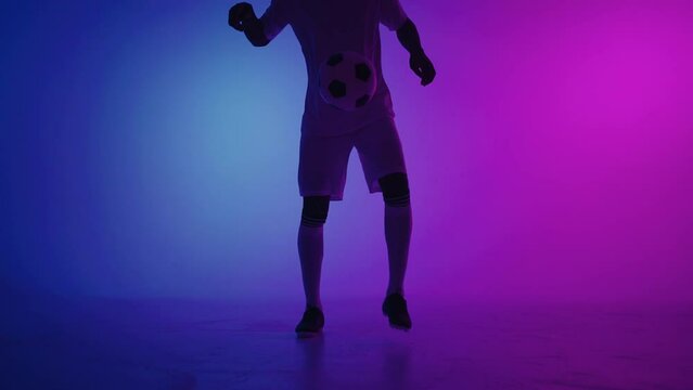 keepie-uppie football ball, closeup of feet of player, technical skills of professional footballer