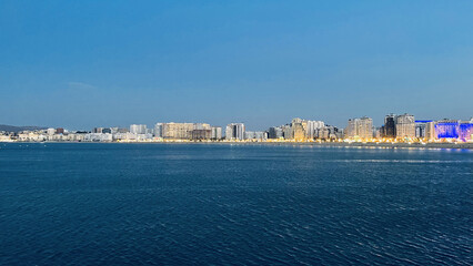 Beautiful view of the blue sea with the city in the background. Tanja Marina Bay, Morocco.