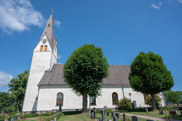Low angle shot of a church from the community of Algutsboda in Kalmar County, Sweden © Aragrim/Wirestock