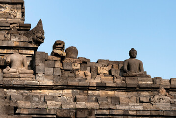 Fototapeta premium Detail of the statues on Borobudur walls