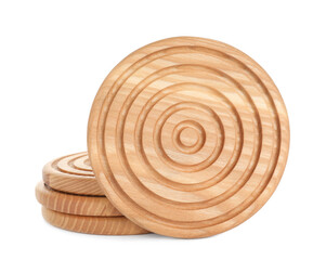 Stylish wooden cup coasters on white background