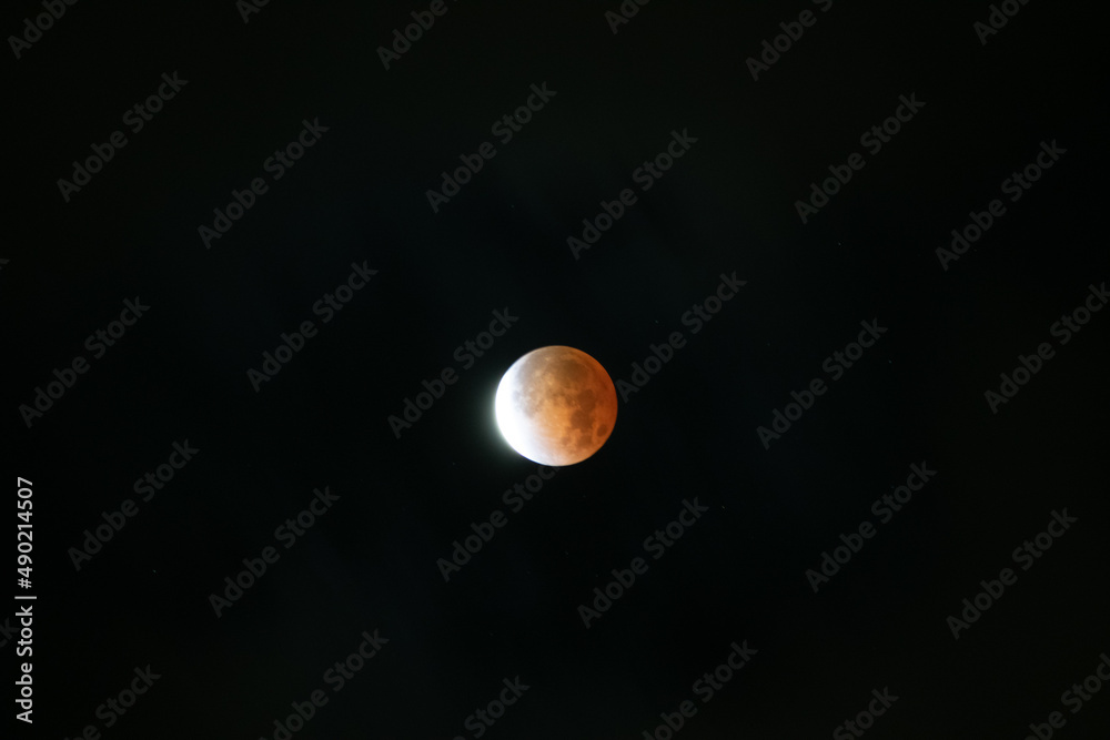 Poster Beautiful lunar eclipse in a dark sky