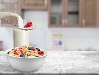 The concept of a healthy breakfast of vegetarian yogurt and fresh fruit on a table