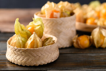 Cape gooseberry or golden berry (Physalis peruviana) on wooden background, Healthy tropical fruit