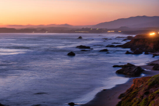 View Of The Pacific Ocean And Waves In Long Exposure At Night In Big Sur, United States