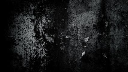 Closeup of a dark grunge background with white stained patterns with copyspace