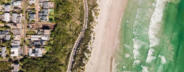  Beautiful aerial shot of houses and tropical beach in Hermanus, South Africa - great for wallpapers © Magellan/Wirestock