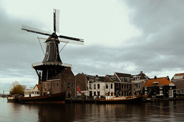 Fototapeta na wymiar Dutch Windmill - Haarlem - Travel - Cloudy