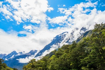 Naklejka premium Mountain covered in Clouds