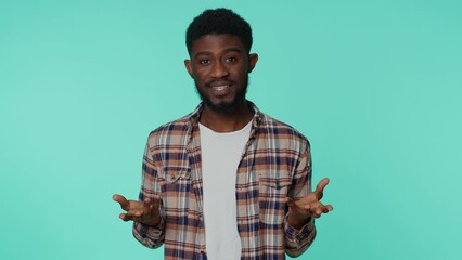 What why. Sincere african american adult man raising hands in indignant expression asking reason of failure demonstrating disbelief irritation by troubles. Young confused guy on blue wall background - Powered by Adobe