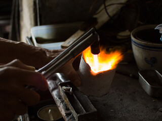 blacksmith working in the furnace