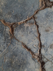cracked plastered concrete floor