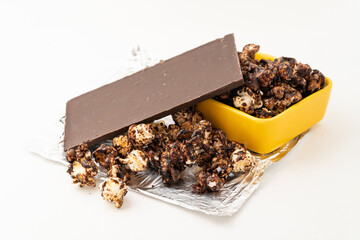 Chocolate caramel popcorn on a solid background