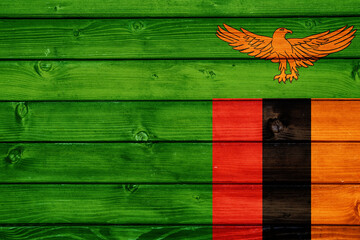 Flag of Zambia on wooden surface 