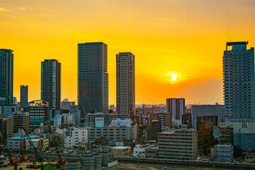 Fototapeta premium ビルと夕日
