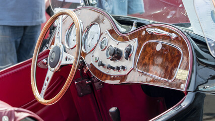 Round steering wheel from a veteran car.